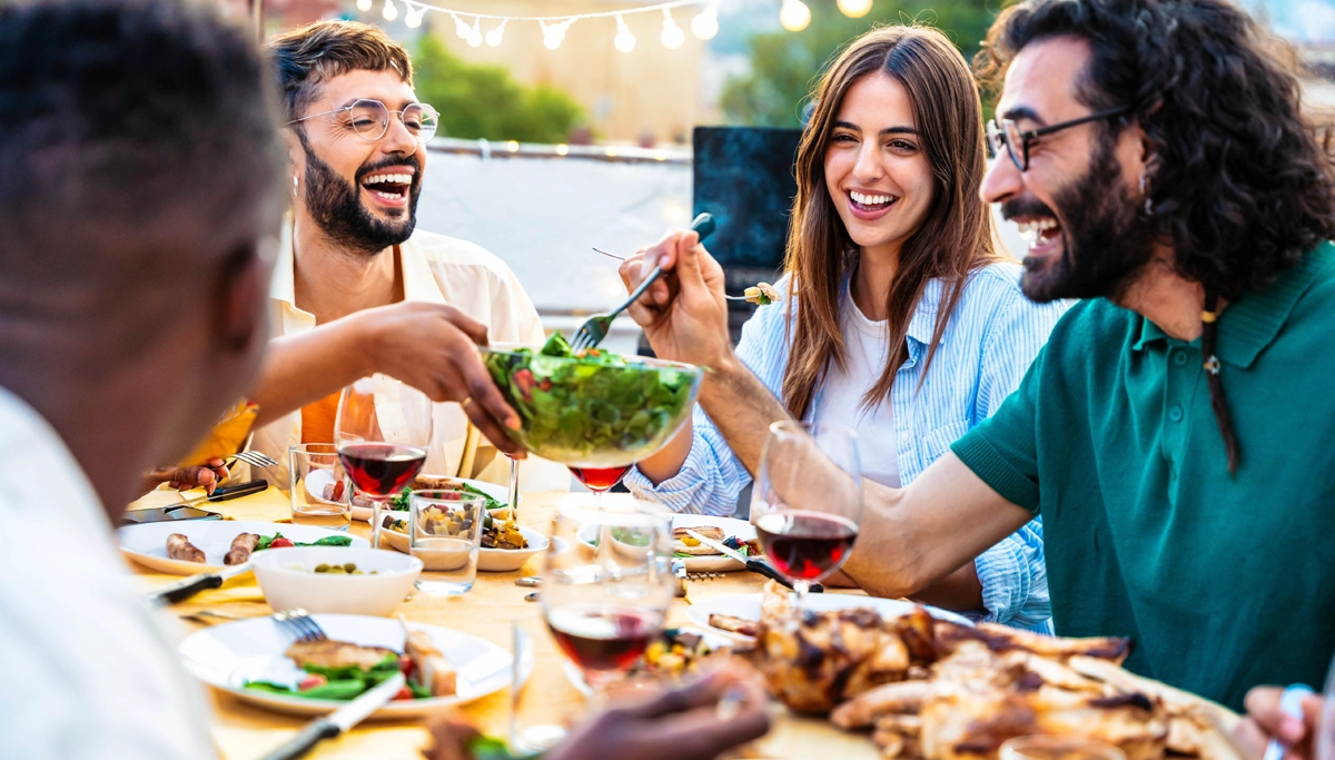 group-of-friends-enjoying-a-meal-together-1200x683.webp