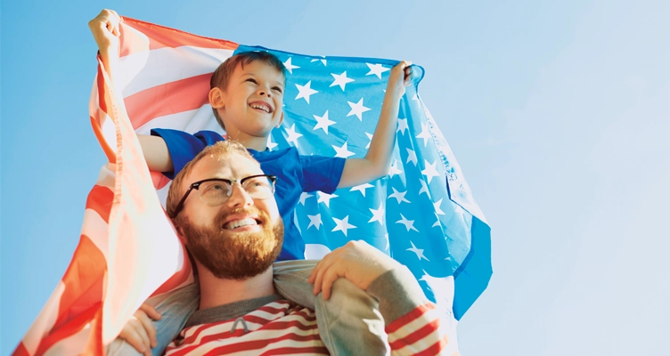 father-and-son-with-american-flag-752x400.webp