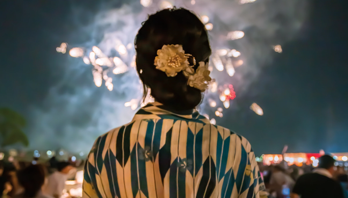 woman-watching-fireworks-1200x683.webp